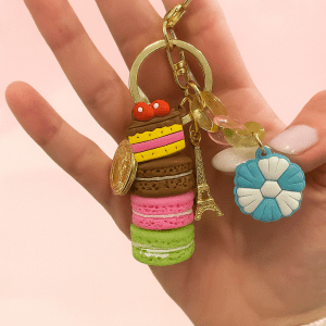 Sweet Collection macaron keychains in pastel colors with cute surprise charms