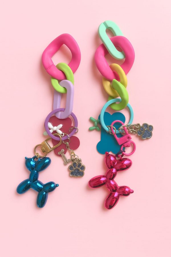 Cute balloon keychain with pastel silicone bracelet, glittery charms, and a soft pink background — part of the Happy Collection by Pasha Love.